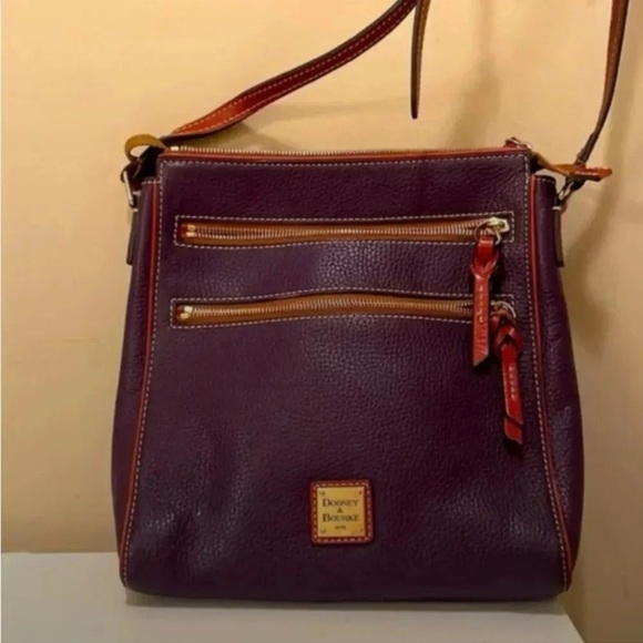 Dooney & Bourke Handbags - Dooney and Burke crossbody purple authentic and rare purse